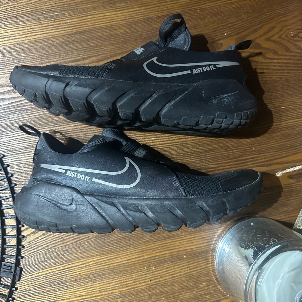 Black Nike Slip ons